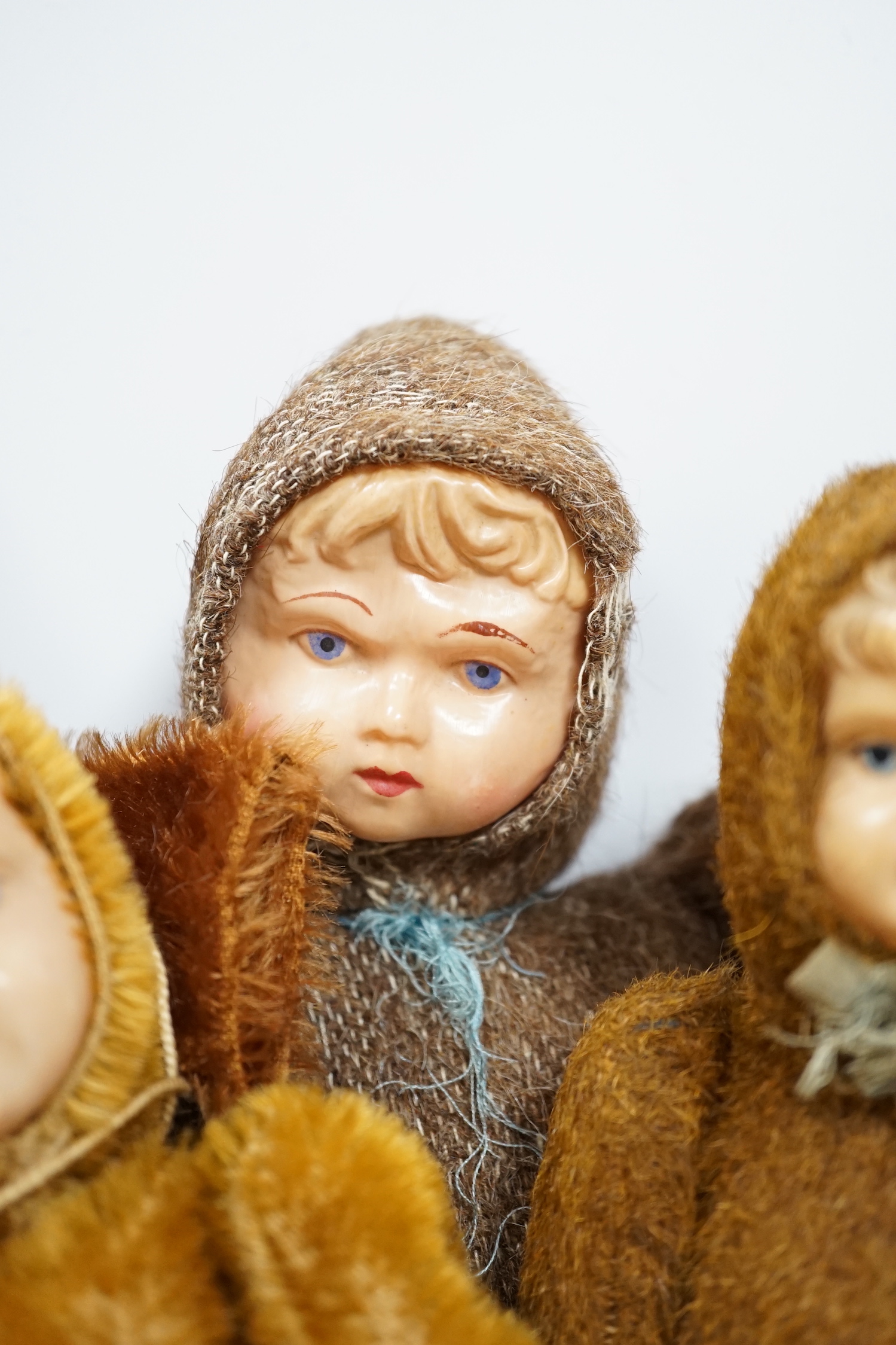 Four Teddy dolls with celluloid faces, c.1990